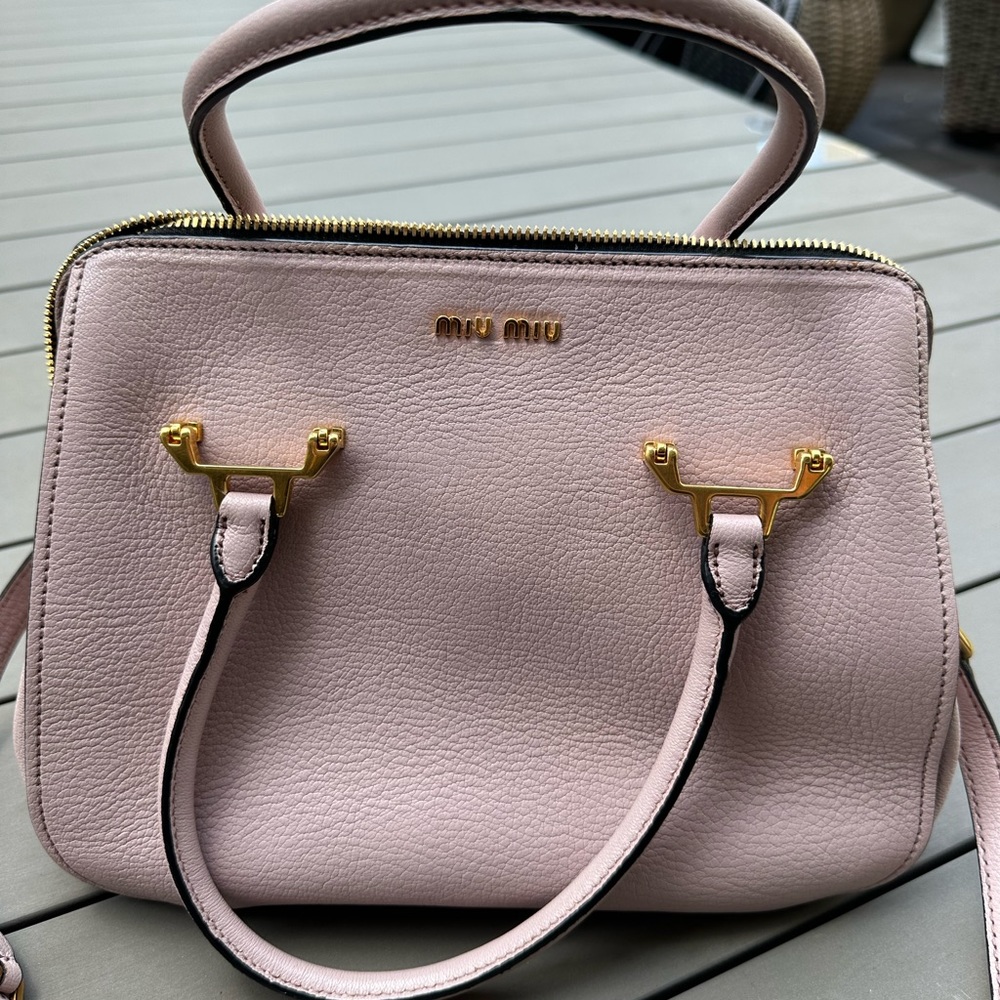 Authentic Miu Miu light pink handbag with authenticity card and dust bag